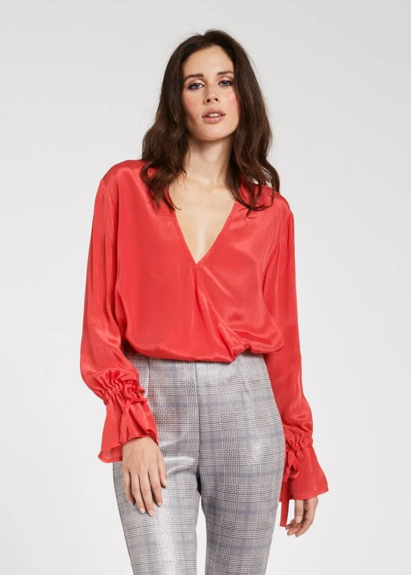 Blusa con scollo a V