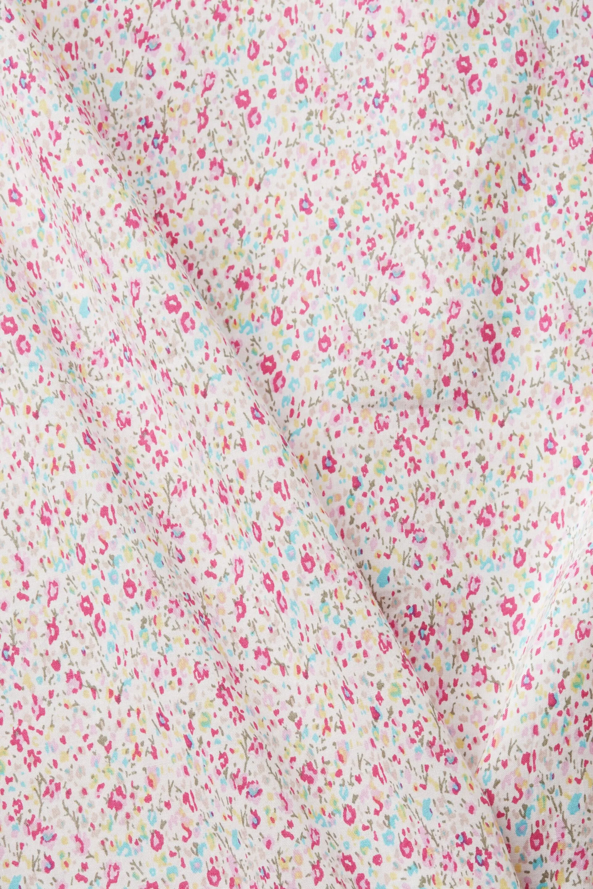 Camicetta floreale con scollo a V e bottoni