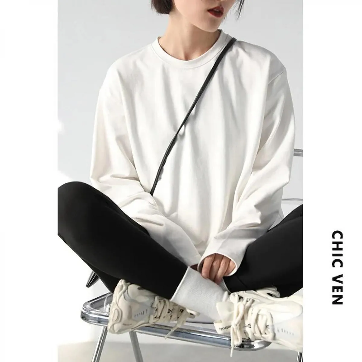 Maglietta a maniche lunghe allentata tinta unita da donna primavera autunno O collo camicia basic con fondo superiore maglietta
