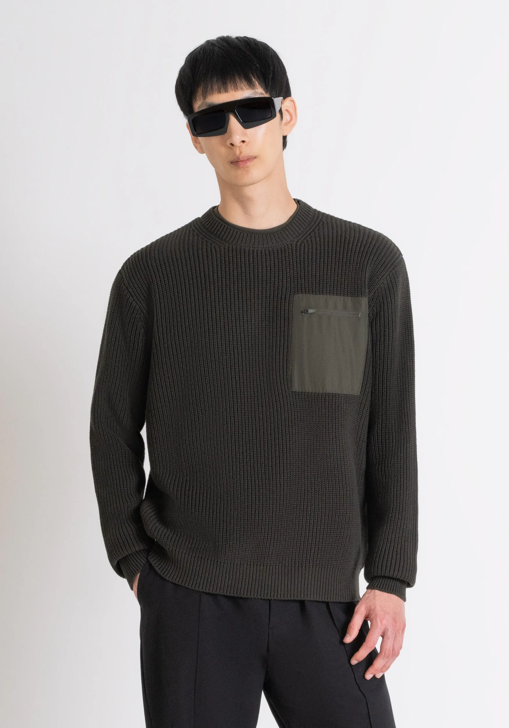 MAGLIONE RELAXED FIT IN COTONE CON TASCA