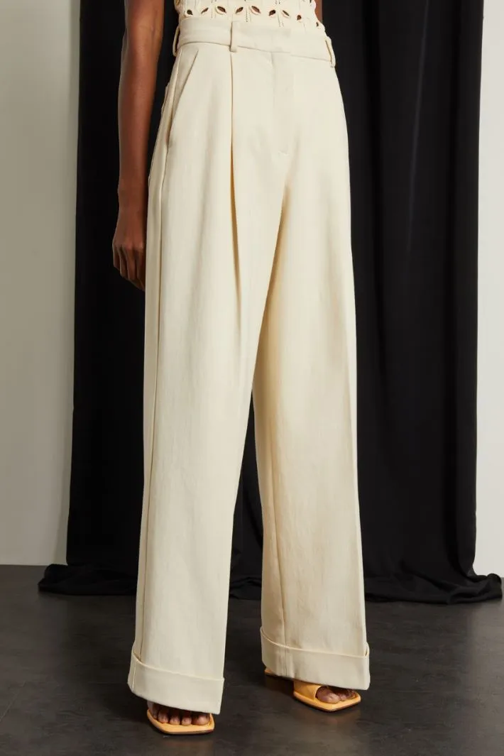 Pantaloni a zampa in crépe