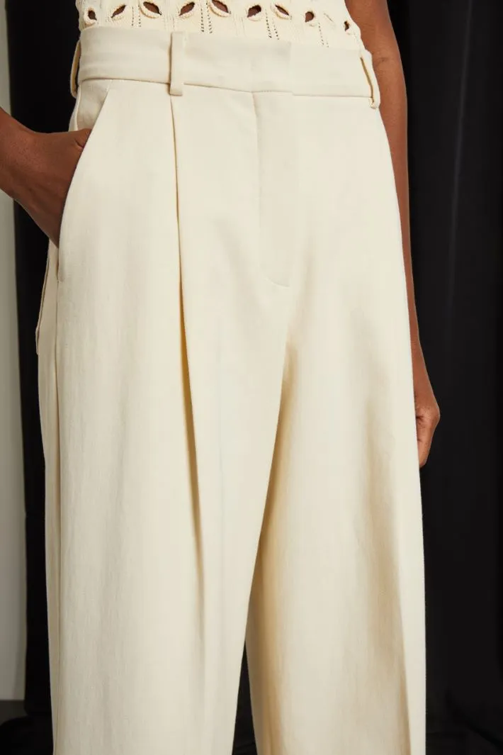 Pantaloni a zampa in crépe