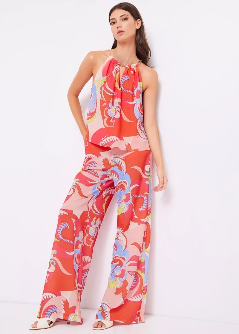 Pantaloni in georgette con stampa floreale