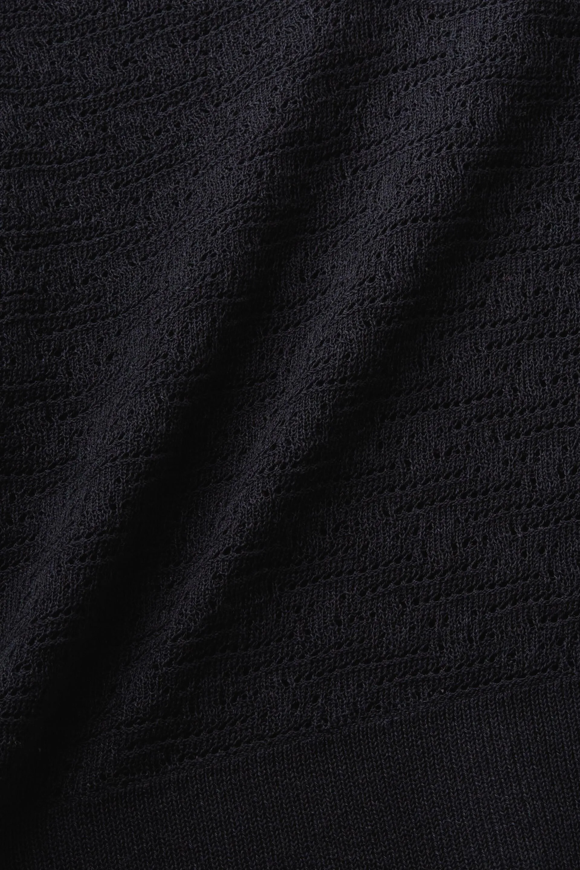 Pullover con lavorazione pointelle e scollo a V